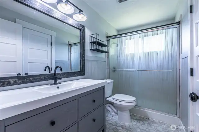 Bathroom with access from Primary bedroom and hallway