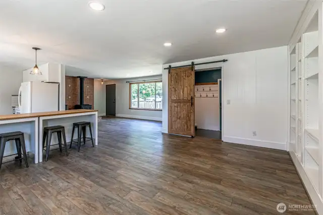 Opposite view of open concept back towards front door with view into the mud room entrance option.