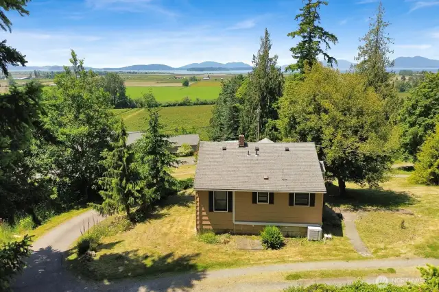 World-class views! Welcome to 16071 Colony Road in beautiful Bow