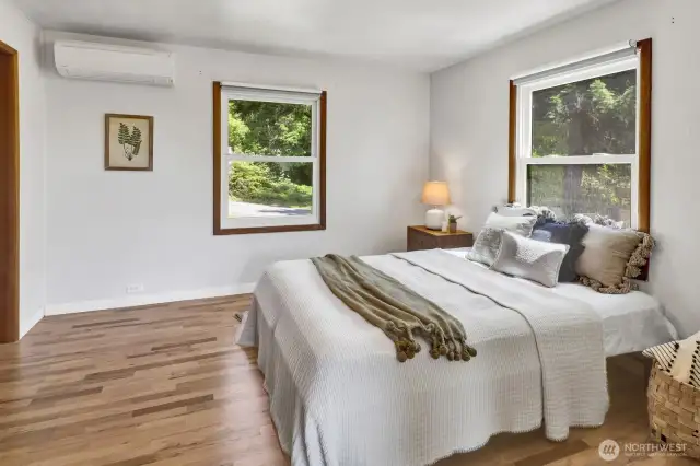 Main level bedroom has a ductless mini-split for heat and cooling