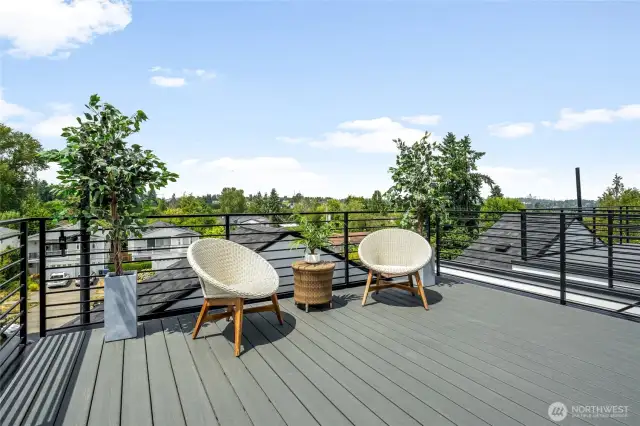 Sunny deck with  city, mountain and territorial views