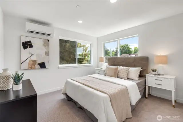 Good-sized primary bedroom with A/C