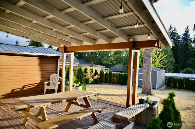 Perfect evening sunlight onto deck, kitchen, and eating space