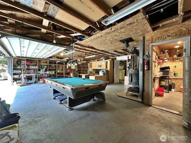 Garage has storage, half bath, small bar, sink with multi use.