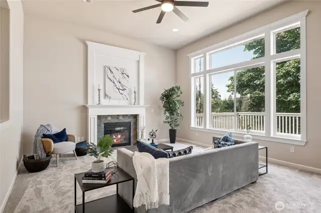 Light-filled living room combines high ceilings with timeless comfort and style.