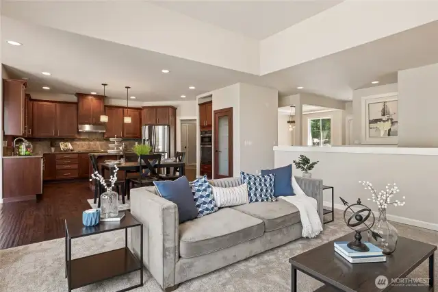Open-concept living room connects effortlessly to the kitchen for easy gatherings.