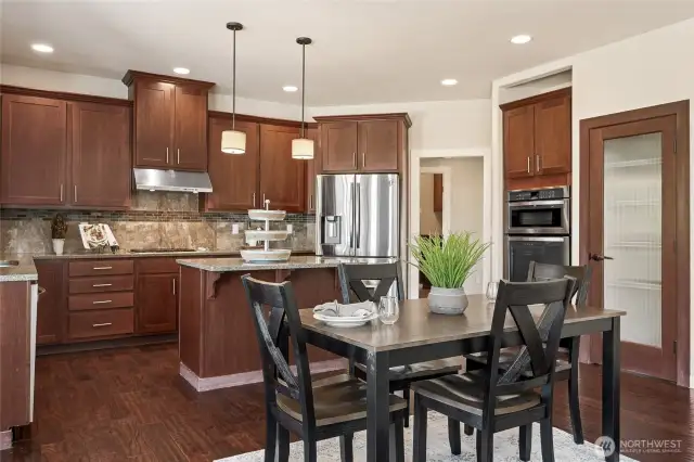 Beautifully designed kitchen and breakfast nook - perfect for casual dining.