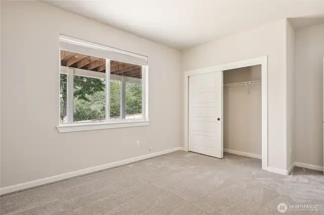 One of two extra bedrooms on the lower level.