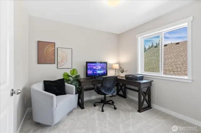 Fourth bedroom upstairs/staged as office