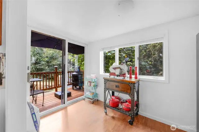 This is the other side of the extra room off of the kitchen which also has access to the deck.