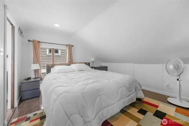 The primary bedroom also includes an attached full bath.