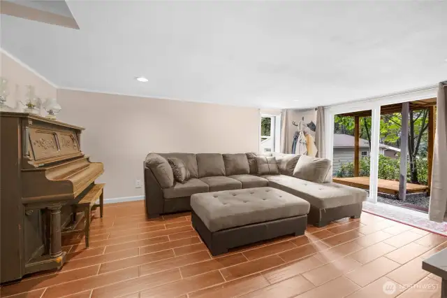 The family room will lead you out onto the back yard of the property.