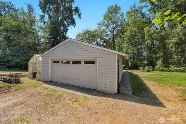 Large 720 square foot garage. There is also a small greenhouse that will stay with the property.