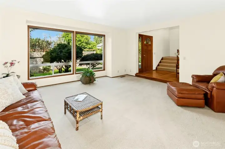 Large windows offer natural light and views outside
