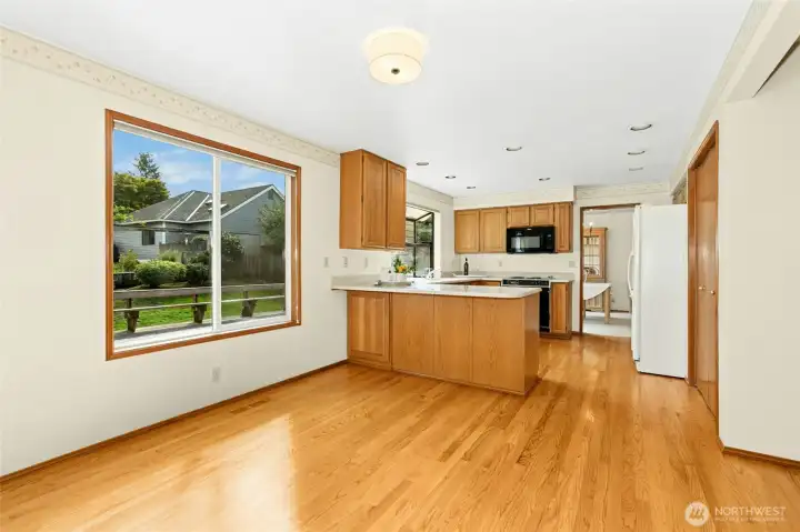 Spacious kitchen at the heart of the home. Note: refrigerator goes w/ Seller
