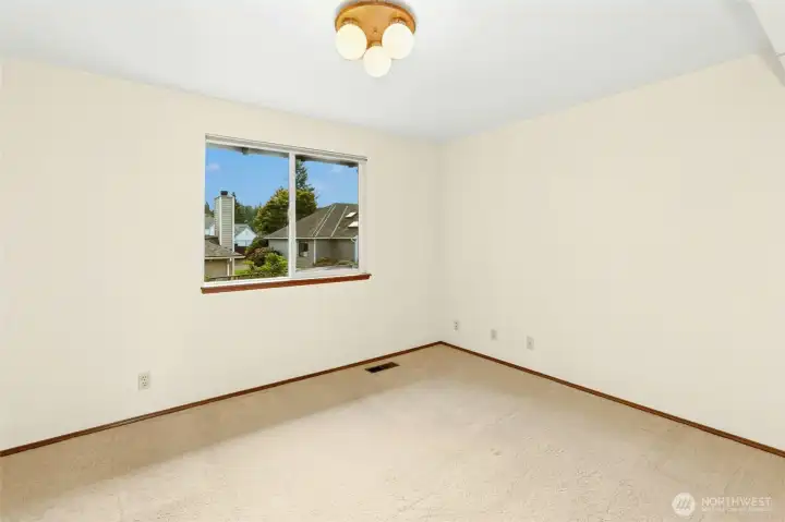 4th and final bedroom with walk-in closet.