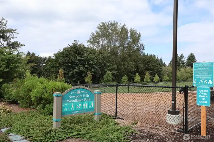 Newport Hills Woodlawn Park nearby, offering off-leash dog play area, large grassy field, trail access, and more.