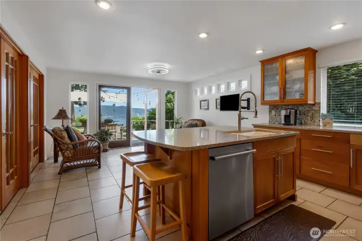 Kitchen has plenty of cabinets w/granite countertops, large walk in pantry and a view while preparing your gourmet meal