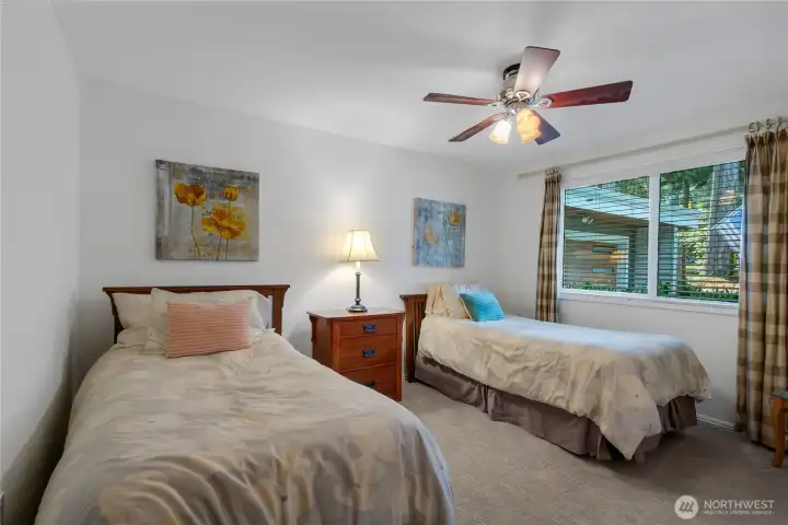 Another large guest bedroom w/ceiling fan.