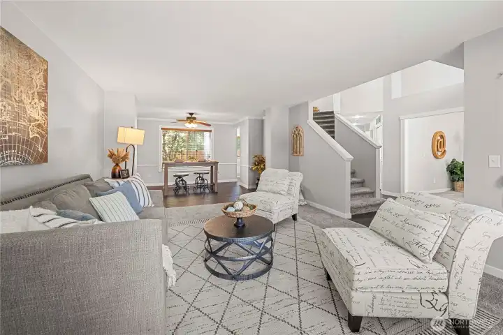 Front living room opens to dining room.