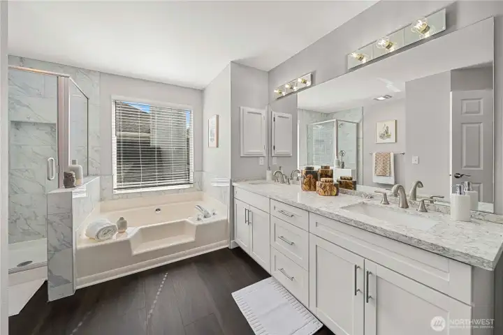 All new cabinetry and double vanity with quartz countertops and new flooring!