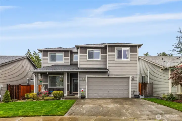 Beautifully maintained two-story home with modern curb appeal, fresh landscaping, and a welcoming covered entry. Located in a quiet, sought-after neighborhood close to parks, schools, and commuter routes.
