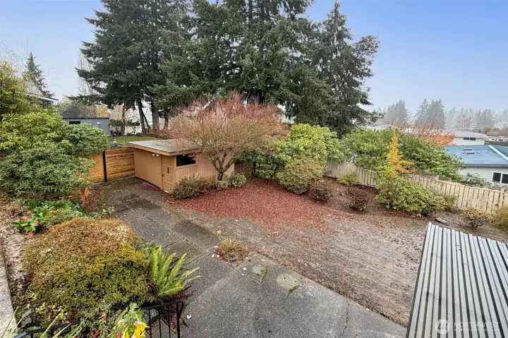 View from the deck looking to the lower yard and shop.