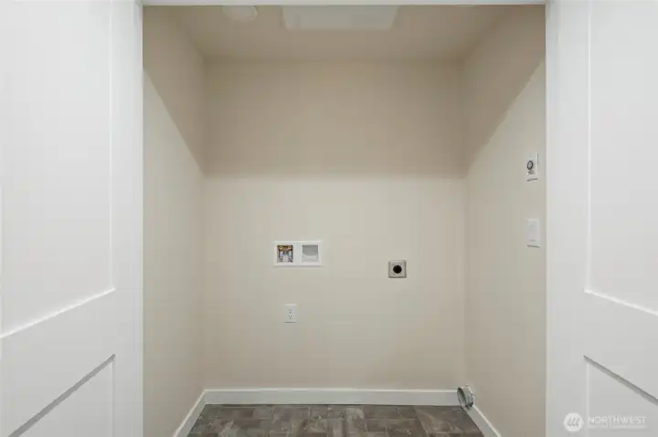 Large closet with laundry hookups.