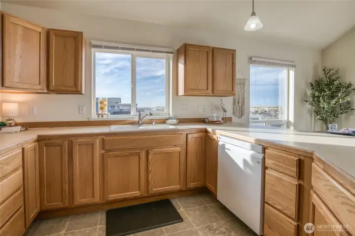 Watch for whales and king tides out this South facing kitchen window.