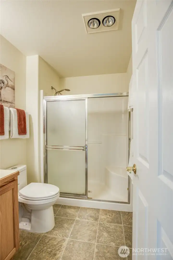 3/4 bathroom with built in bench.