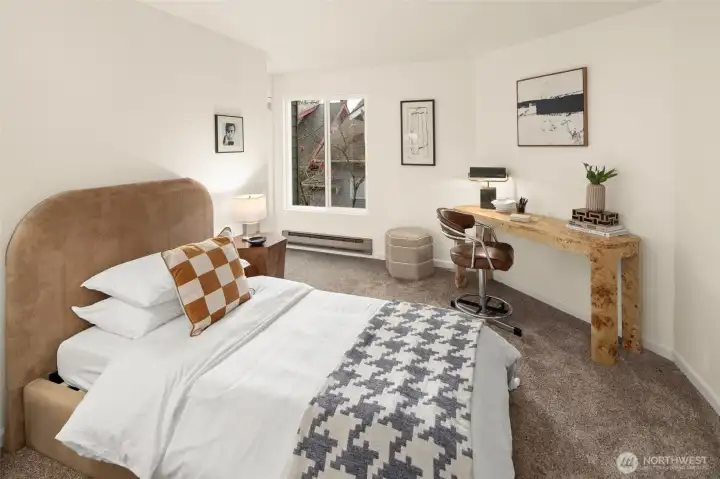 Flexible second bedroom that adapts easily - guest space, office, creative studio, or all three.