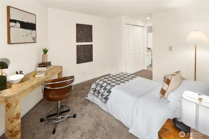 An appreciated design detail: this bedroom can function as an ensuite too, with access from the main living area that can be closed off for privacy when needed.