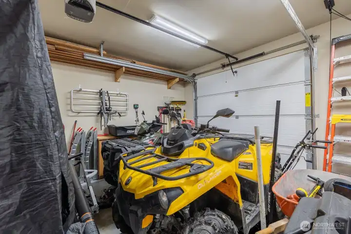 garage with 2 off-road quads, tools and sports equipment included