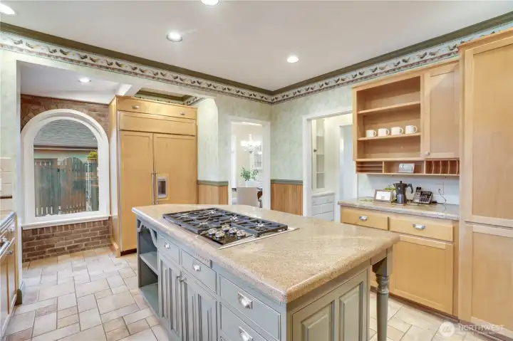 Six burners, a center island, and room for the whole family.