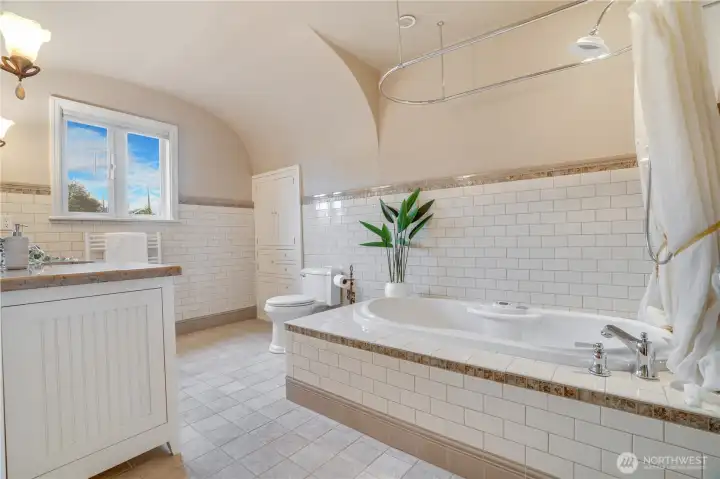 The soaking tub that makes this floor complete.