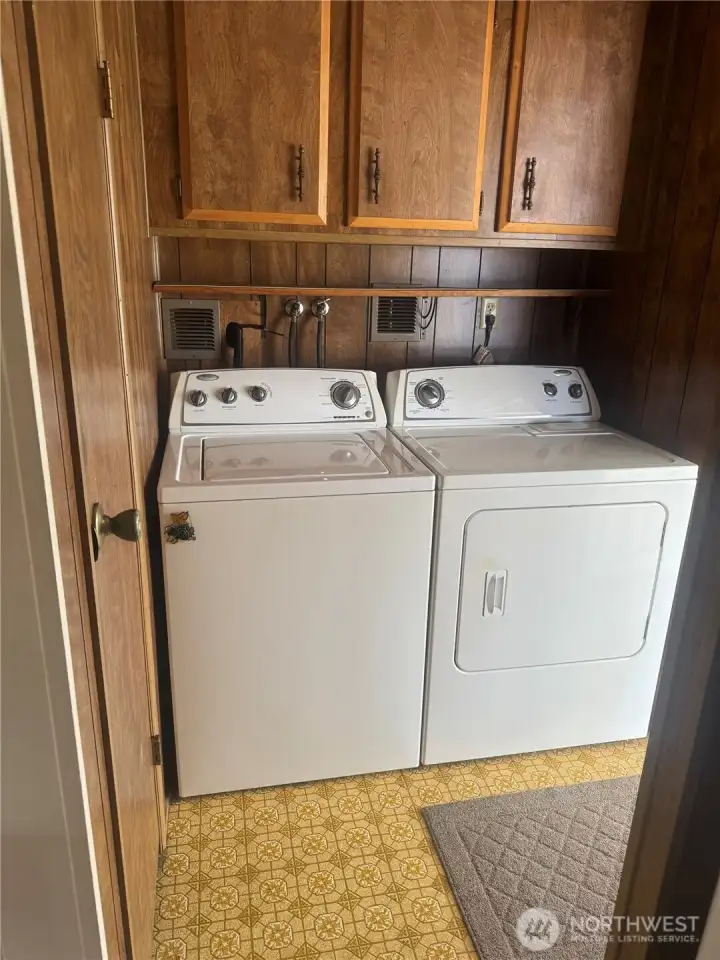 Utility area just inside the front door