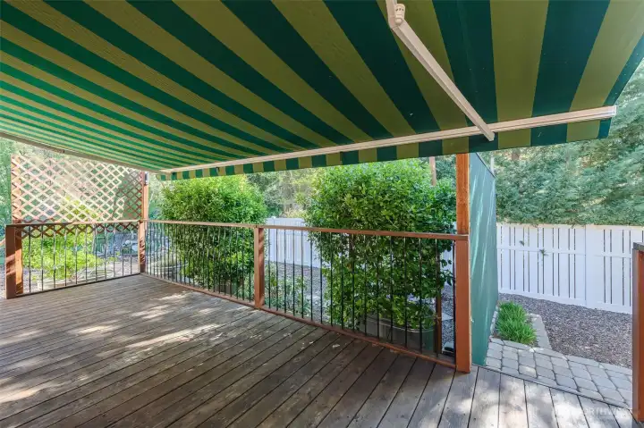 Retractable shade over deck