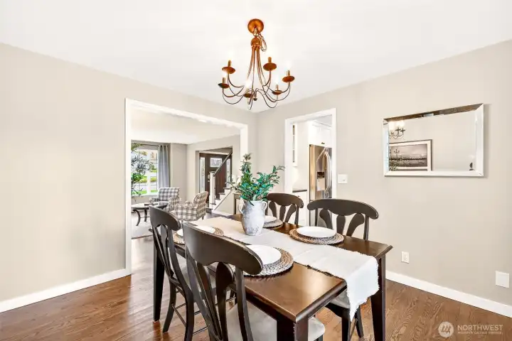 From the dining room, you enjoy a connected sightline to both the living room and kitchen — an open, airy flow that makes entertaining and daily routines equally enjoyable.