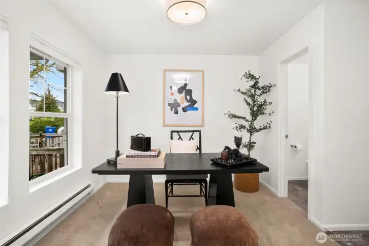 Office/flex space to your left right as you enter through the front door with an adjoining powder room.