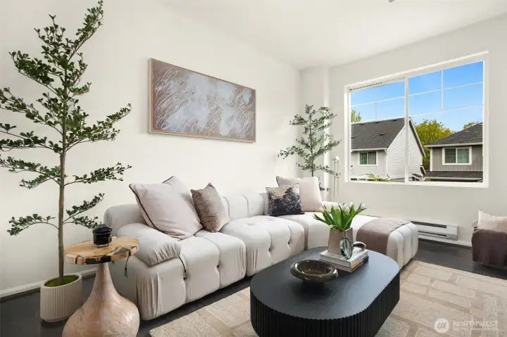 Bright, comfortable, and easy to furnish, with large windows that keep the space feeling open year-round.