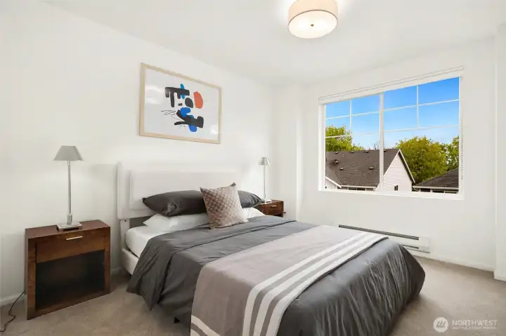 Second en-suite bedroom on the top floor with plenty of light.