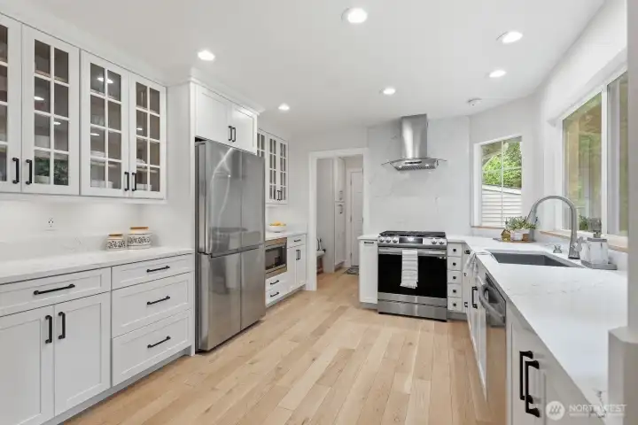 All new kitchen with new cabinetry, quartz counters and new stainless appliances.