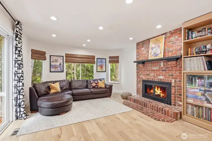 Second Living Area with brick surround wood burning fireplace.