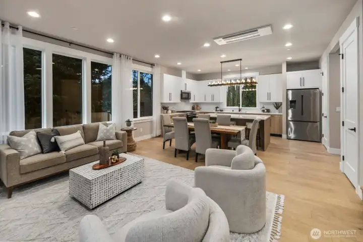 Expansive windows that bathe the interiors in abundant natural light.