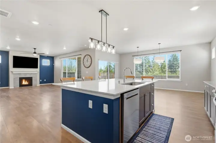 A true open floor plan connects the living, dinning and kitchen spaces. Accent colors lend a designer's touch throughout the home. A true open floor plan connects the living, dinning and kitchen spaces. Accent colors lend a designer's touch throughout the home.