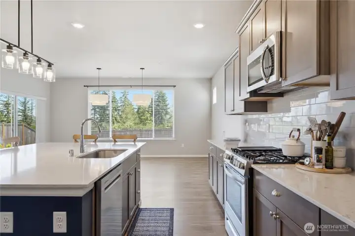 Large windows bring natural light and views beyond. There are no homes behind to obstruct the views. Large windows bring natural light and views beyond. There are no homes behind to obstruct the views.