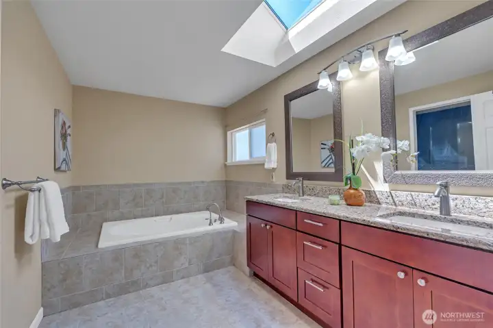 Primary ensuite with double vanity.