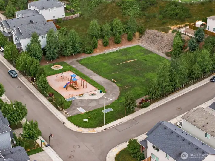Aerial perspective showcasing the areas play and park area.