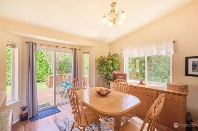Dining area has a sunny, south facing window and a slider to the private back deck