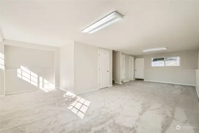 Large L-shaped downstairs rec-room. Room to possibly frame in another bedroom downstairs!